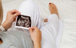 woman with successful egg after ivf treatment
