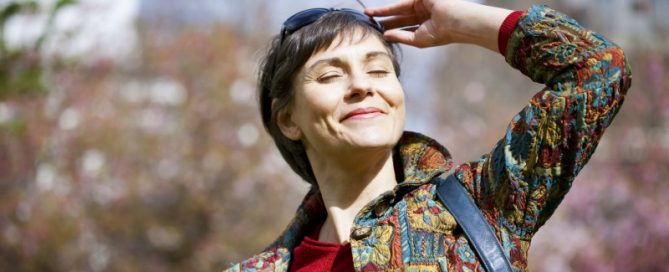 Happy Woman Taking Vitamin D for her Fertility