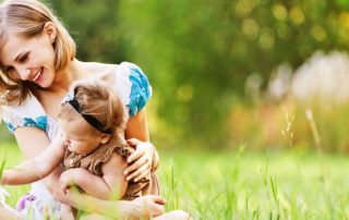 Happy Mother and her baby after womb transplant